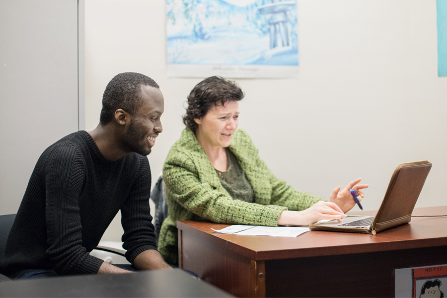 A student meets with an advisor.